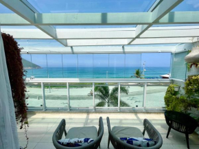 Frente mar- Apto pé na areia com charme e conforto